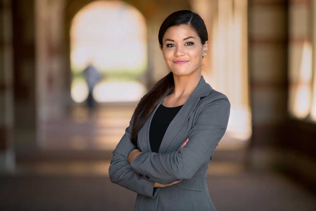 Confident business woman with successful expression mixed race caucasian asian latin woman